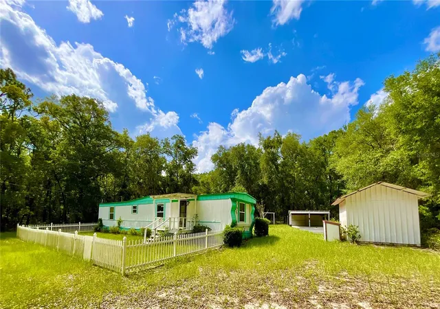 Photo 1 of Manufactured home for sale at 8232 Swan Lake Rd, Melrose, FL 32666 | MLS# GC541501 | Listing updated on 2026-07-20