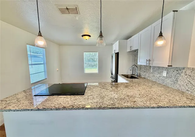 Photo 4 of Single family home for sale at 311 W Bella Vista St, Lakeland, FL 33805 | MLS# TB8523694 | Listing updated on 2026-10-25