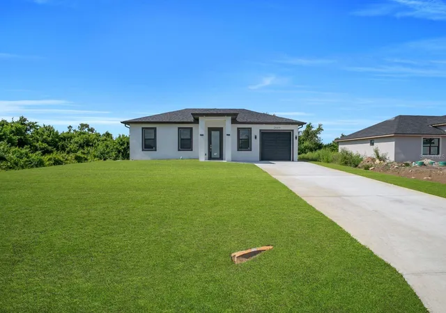 Photo 1 of Single family home for sale at 2609 21st Street SW, LEHIGH ACRES, FL 33976 | MLS# A4698256 | Listing updated on 2026-10-14