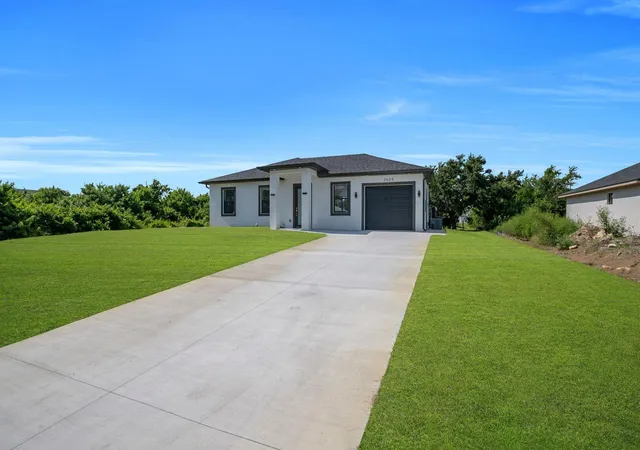 Photo 2 of Single family home for sale at 2609 21st Street SW, LEHIGH ACRES, FL 33976 | MLS# A4698256 | Listing updated on 2026-10-14