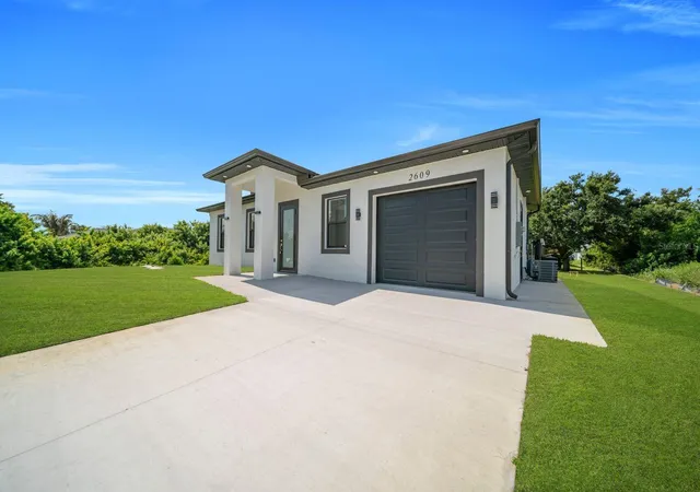 Photo 2 of Single family home for sale at 2609 21st Street SW, Lehigh Acres, FL 33976 | MLS# A4698256 | Listing updated on 2026-10-14