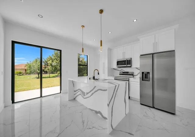 Photo 4 of Single family home for sale at 2609 21st Street SW, Lehigh Acres, FL 33976 | MLS# A4698256 | Listing updated on 2026-10-14