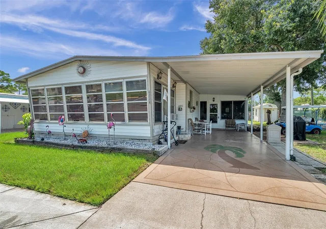 Photo 2 of Manufactured home for sale at 6524 Roosevelt Dr, Port Richey, FL 34668 | MLS# W7887113 | Listing updated on 2026-07-29