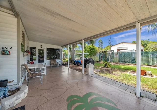 Photo 3 of Manufactured home for sale at 6524 Roosevelt Dr, Port Richey, FL 34668 | MLS# W7887113 | Listing updated on 2026-07-29