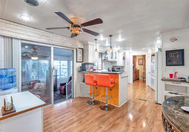 Photo 4 of Manufactured home for sale at 6524 Roosevelt Dr, Port Richey, FL 34668 | MLS# W7887113 | Listing updated on 2026-07-29