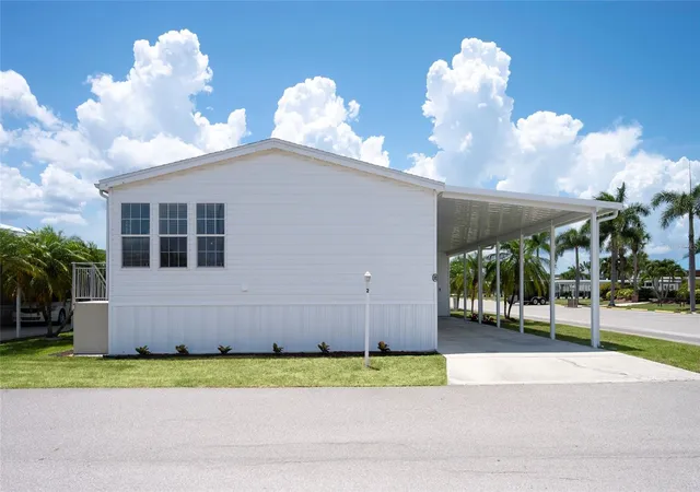 Photo 1 of Manufactured home for sale at 2 Holland Dr #39E, Punta Gorda, FL 33950 | MLS# C7527800 | Listing updated on 2026-07-10