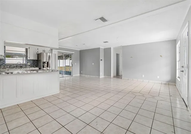 4th image of 1719 Julian Lane Dr, Tampa, FL 33619 | MLS# O6420423