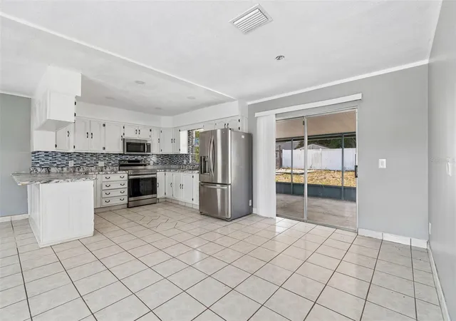 5th image of 1719 Julian Lane Dr, Tampa, FL 33619 | MLS# O6420423