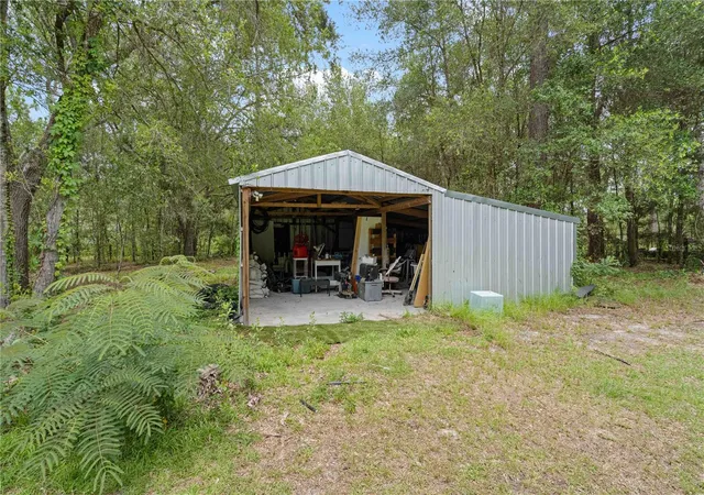 Photo 2 of Single family home for sale at 9459 N Eubanks Ter, Dunnellon, FL 34433 | MLS# OM727502 | Listing updated on 2026-09-07