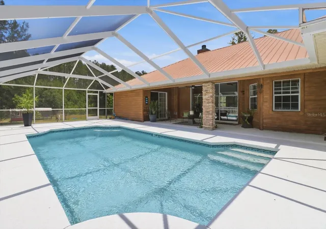 2nd image of 12143 Ne 47th Pl, Silver Springs, FL 34488 | MLS# OM727514