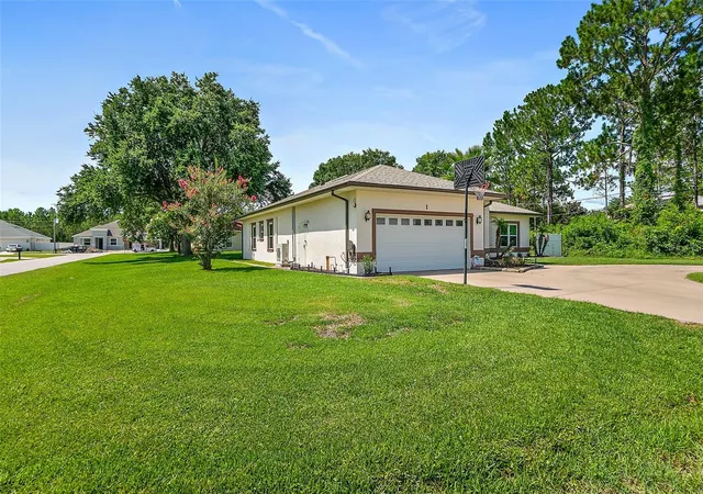 Photo 2 of Single family home for sale at 1 Slipper Flower Path E, Palm Coast, FL 32164 | MLS# FC319564 | Listing updated on 2026-08-20