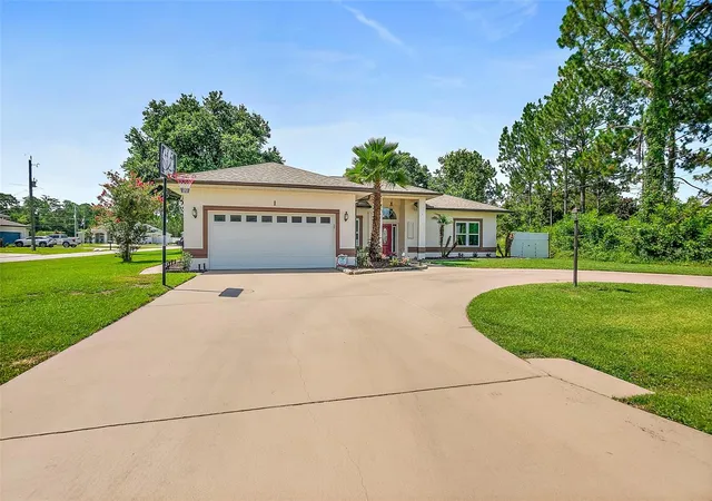 Photo 2 of Single family home for sale at 1 Slipper Flower Path E, Palm Coast, FL 32164 | MLS# FC319564 | Listing updated on 2026-08-20