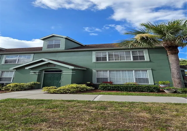 Listing Photo 1 - Condo for sale in building located at 9306 Lake Chase Island Wy, TAMPA, FL 33626