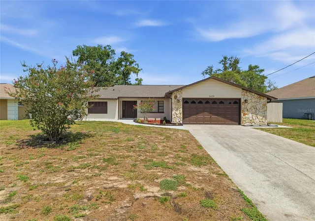 Photo 2 of Single family home for sale at 2433 Waterfall Dr, Spring Hill, FL 34608 | MLS# TB8524083 | Listing updated on 2026-09-23