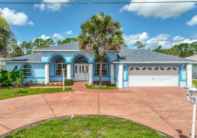 Photo 1 of Single family home for sale at 4 Rainstone Ln, Palm Coast, FL 32164 | MLS# FC319568 | Listing updated on 2026-10-02