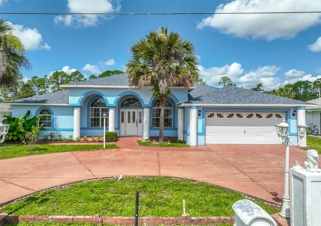 Photo 3 of Single family home for sale at 4 Rainstone Ln, Palm Coast, FL 32164 | MLS# FC319568 | Listing updated on 2026-10-02