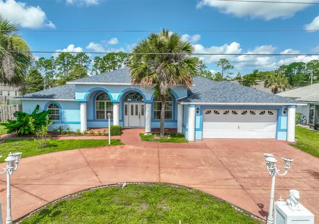 Photo 3 of Single family home for sale at 4 Rainstone Ln, Palm Coast, FL 32164 | MLS# FC319568 | Listing updated on 2026-10-02