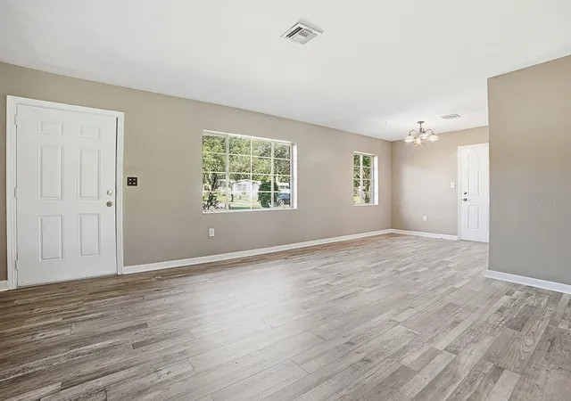 Photo 3 of Single family home for sale at 404 Louis St, Leesburg, FL 34748 | MLS# O6420704 | Listing updated on 2026-10-05