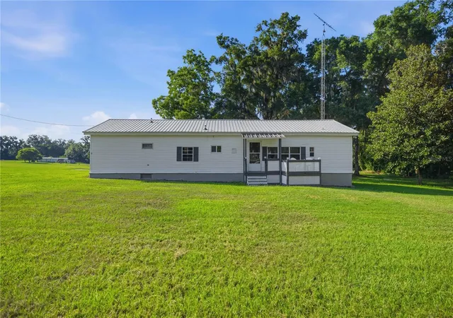 1st image of 4950 Se 112th Street Rd, Belleview, FL 34420 | MLS# OM727569