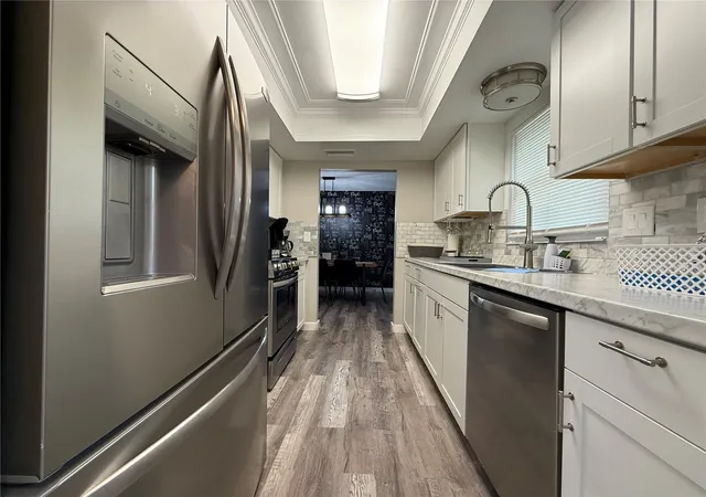Photo 3 of Single family home for sale at 3988 San Luis Dr, Sarasota, FL 34235 | MLS# A4698438 | Listing updated on 2026-08-25