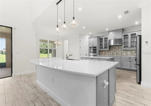 Photo 4 of Single family home for sale at 1100 Windlass Ct, Kissimmee, FL 34746 | MLS# O6420849 | Listing updated on 2026-09-28