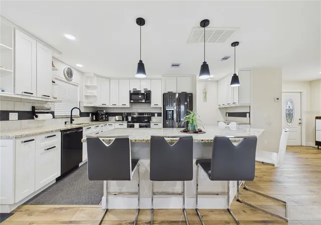 Photo 3 of Single family home for sale at 132 Concord Dr NE, Port Charlotte, FL 33952 | MLS# GC541555 | Listing updated on 2026-07-16