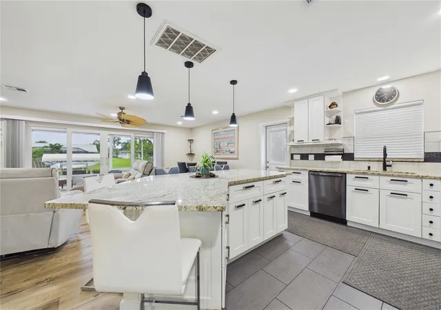 Photo 4 of Single family home for sale at 132 Concord Dr NE, Port Charlotte, FL 33952 | MLS# GC541555 | Listing updated on 2026-07-16