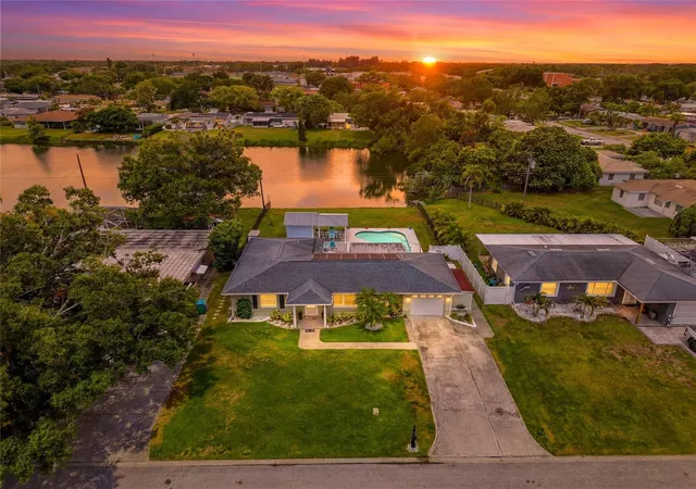 Photo 2 of Single family home for sale at 4822 60th Way N, Kenneth City, FL 33709 | MLS# TB8524435 | Listing updated on 2026-10-08
