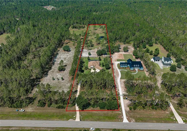 Photo 3 of Single family home for sale at 4345 Old Kings Rd N, Palm Coast, FL 32137 | MLS# FC319609 | Listing updated on 2026-09-28