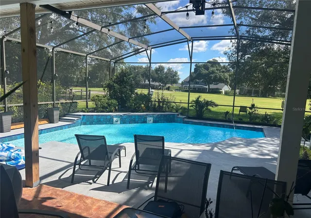 Photo 2 of Single family home for sale at 2435 Sweetwater Country Clb Pl Dr, Apopka, FL 32712 | MLS# O6420954 | Listing updated on 2026-10-01