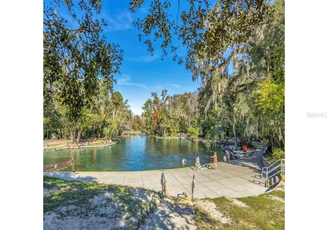 33rd image of 2435 Sweetwater Country Club Pl Dr, Apopka, FL 32712 | MLS# O6420954