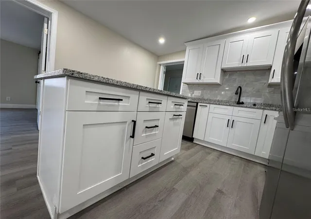 Photo 4 of Single family home for sale at 7039 E Lenox Dr, New Port Richey, FL 34653 | MLS# TB8524467 | Listing updated on 2026-08-20