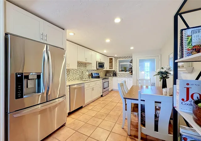 Photo 3 of Single family home for sale at 202 Peacock Ln #A, Holmes Beach, FL 34217 | MLS# A4698503 | Listing updated on 2026-09-22