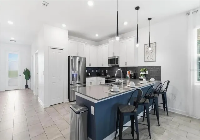 4th image of 9114 Sommerset Hills Dr, Davenport, FL 33896 | MLS# TB8524488