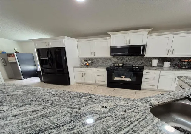 Photo 4 of Single family home for sale at 3114 Stern Ct, Kissimmee, FL 34743 | MLS# O6421025 | Listing updated on 2026-08-11