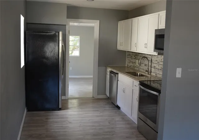 Photo 3 of Single family home for sale at 1328 3rd Street NE, Winter Haven, FL 33881 | MLS# O6421049 | Listing updated on 2026-09-25
