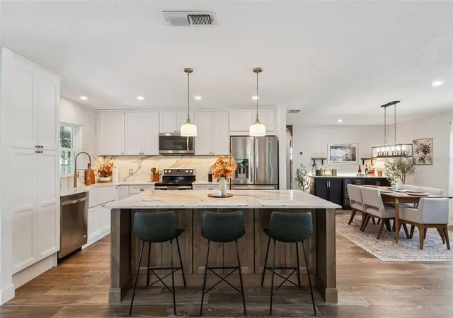 Photo 2 of Single family home for sale at 8156 Caraway Dr, Orlando, FL 32819 | MLS# O6421075 | Listing updated on 2026-08-09