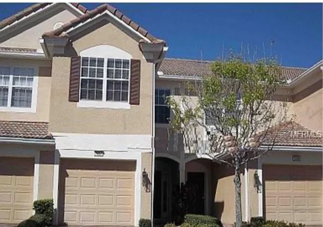 Photo 1 of Townhouse for sale at 7057 Cadiz Blvd, Orlando, FL 32819 | MLS# O6421092 | Listing updated on 2026-08-16