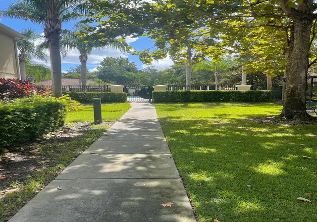 Photo 2 of Townhouse for sale at 7057 Cadiz Blvd, Orlando, FL 32819 | MLS# O6421092 | Listing updated on 2026-08-16