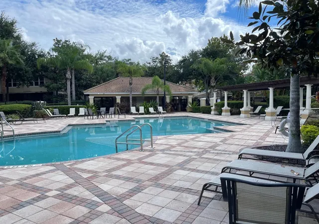 Photo 2 of Townhouse for sale at 7057 Cadiz Blvd, Orlando, FL 32819 | MLS# O6421092 | Listing updated on 2026-08-16