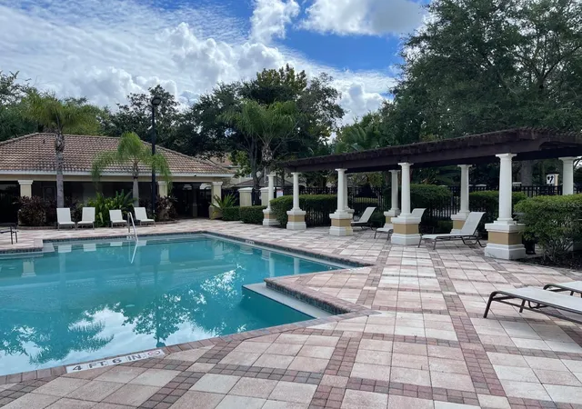 Photo 4 of Townhouse for sale at 7057 Cadiz Blvd, Orlando, FL 32819 | MLS# O6421092 | Listing updated on 2026-08-16
