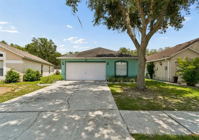 1st image of 5936 Lake Front Dr, Wesley Chapel, FL 33545 | MLS# TB8524690