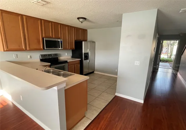 Photo 3 of Townhouse for sale at 13433 Starry Night Ct #11, Orlando, FL 32824 | MLS# O6421186 | Listing updated on 2026-08-27