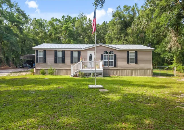 Photo 1 of Manufactured home for sale at 6679 Nw 27th Place, Bell, FL 32619 | MLS# GC541588 | Listing updated on 2026-09-30