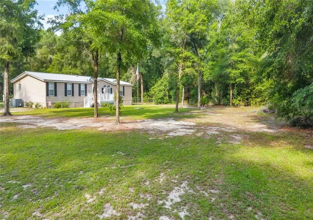 Photo 2 of Manufactured home for sale at 6679 Nw 27th Place, Bell, FL 32619 | MLS# GC541588 | Listing updated on 2026-09-30