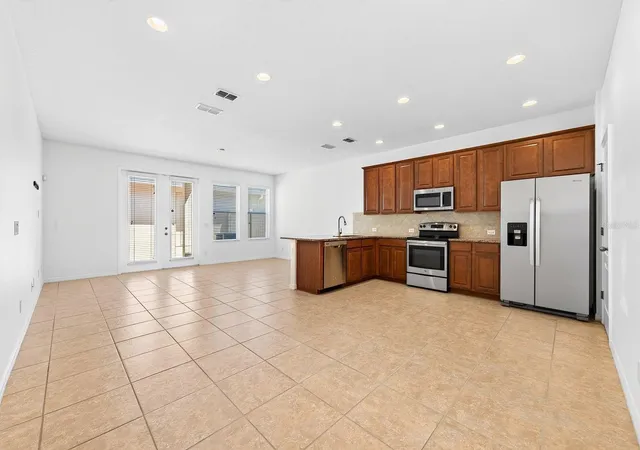 Photo 2 of Townhouse for sale at 11429 Brownstone St, Windermere, FL 34786 | MLS# O6421245 | Listing updated on 2026-09-17