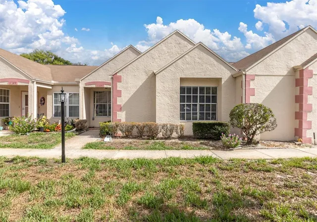 Photo 1 of Condo for sale at 11337 Versailles Ln, Port Richey, FL 34668 | MLS# W7887228 | Listing updated on 2026-10-20