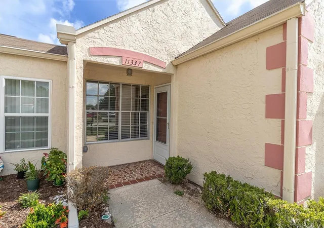 Photo 2 of Condo for sale at 11337 Versailles Ln, Port Richey, FL 34668 | MLS# W7887228 | Listing updated on 2026-10-20