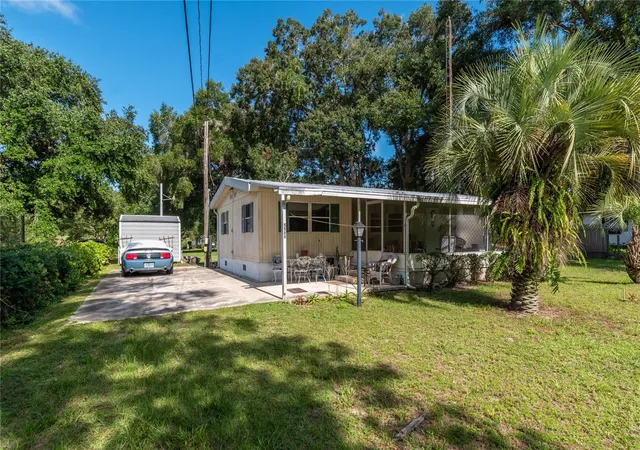 1st image of 5888 Se 164th Ave, Ocklawaha, FL 32179 | MLS# TB8524827