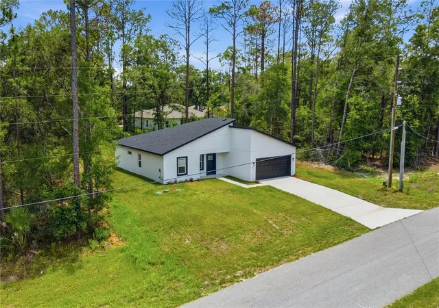 4th image of 8809 N Circular Wy, Dunnellon, FL 34434 | MLS# O6421308